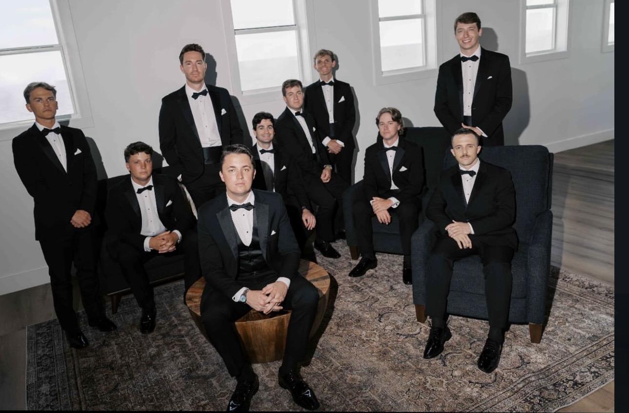 Groom and groomsmen in formal attire